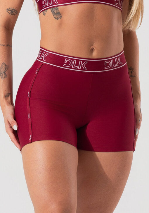 Short fitness feminino com elásticos no cós e na lateral activity dlk vinho